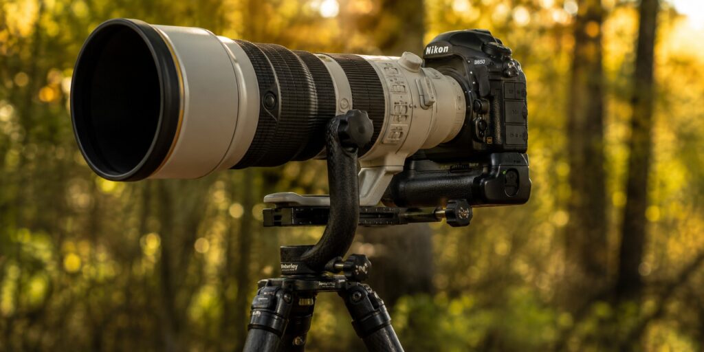 Nikon D850 camera equipped with MB-D18 battery grip and 500mm f/4 lens on a gimbal tripod